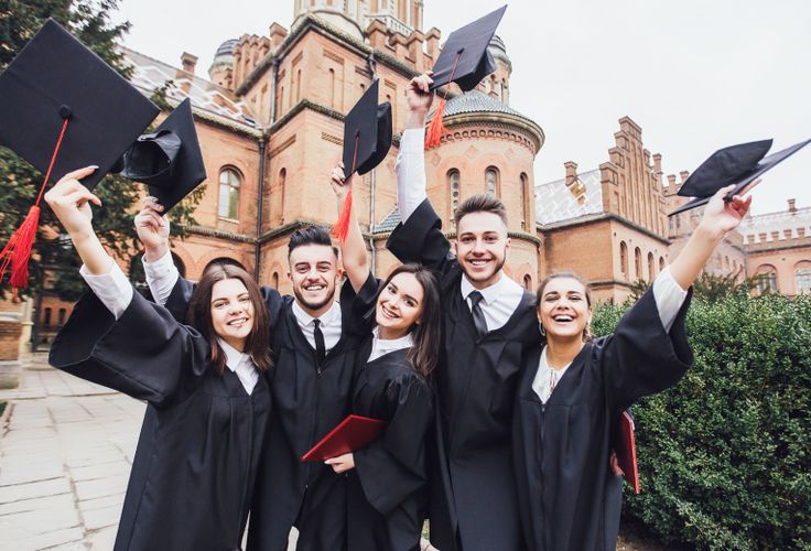 A focused student studying at a desk with books, indicating academic support.